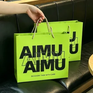 Bright Green Paper Gift Bag Modern Bold Letter Printed Retail Handbag Reusable Boutique Packaging for Clothing Stores