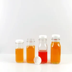 Clear Empty Juice Coffee Beverage Mineral Water Carbonated Drink Glass Bottle with Plastic Lids