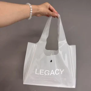 Clear PVC Jelly Vest Tote Bag Custom Snap Button Plastic Handbag Reusable Shopping Packaging Bag for Clothing Gift