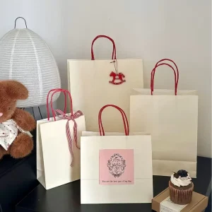 Cream colored Kraft Paper Gift Bags Solid color Shopping Tote Bags for Clothing Baking and Milk Tea Packaging