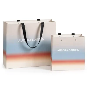 Custom Eco Friendly Durable Luxury Cosmetics Jewelry Promotion Gift Paper Bags with Embossed Logo Ribbon Handles Recyclable