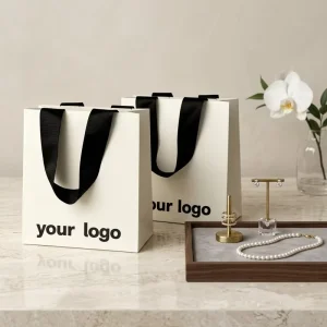 Custom Eco Friendly Luxury Cosmetics and Jewelry Shopping Gift Paper Bags Embossing Process Embossed logo with Ribbon Handles
