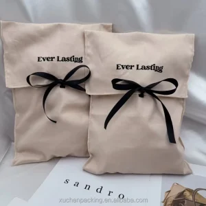 Custom Envelope style 100% Cotton Dust Bags for Leather Journals Long Ribbon Bow Cotton Apparel Packaging Bag