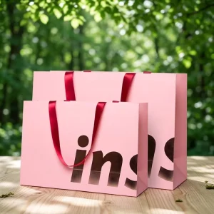 Custom Logo Cutout Letter Pink Matte Kraft Paper Shopping Bag Rope Handle Luxury Retail Gift Packaging with Bronzing