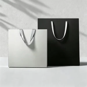 Custom Logo Embossing Printed Clothing Cardboard Retail Paper Shopping Bag Luxury Gift Packaging Paper Bags With Handle Rope