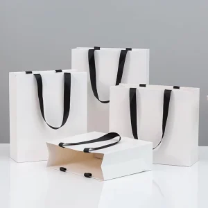 Custom Logo Luxury Gold Foil Matte Embossed Laminated Paper Bag Large Medium White Gift Sturdy Paper Clothing Store Shopping Bag