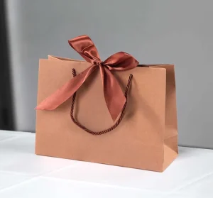 Custom Logo Luxury Paper Tote Bag Heavy Duty Paperboard Ribbon Handle Laminated Gold Foil for Cosmetic Boutique Gift Packaging