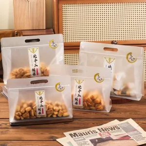 Custom Logo Plastic Resealable Flat Bottom Packaging Bag With Handle Food Bag for Snack Candy Grain Food Rice Nuts