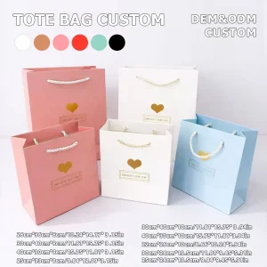 Custom Logo Printed Luxury 300G White Cardboard Gold Foil Ribbon Handle Packaging Paper Bag for Apparel Boutique Retail Shopping