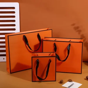 Custom Logo White Cardboard Shopping Bags with Ribbon Handles for Clothing Cosmetics Jewelry and Gifts
