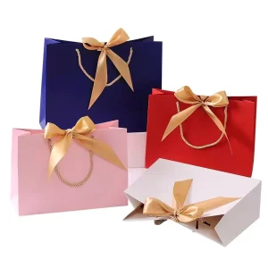 Custom Luxury Eco friendly Christmas Paper Bag Cotton Rope Handle Embossed Logo Recycled Coated Paper Hot Stamping Clothing