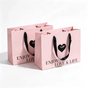 Custom Packaging and Printing Pink Matte Satin Handle Heart Print for Wedding Boutique Gift Paper Bag