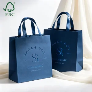 Custom Printed White Cardboard Shopping Bags Luxury Retail Packaging Custom Logo Gift Carrier Bags Manufacturer