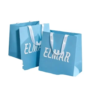 Custom Sky Blue Paper Gift Bags Silver Foil Logo Matte Finish Satin Ribbon Handle Luxury Shopping Bags for Skincare Boutique