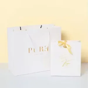 Custom White Premium Luxury Cardboard Paper Bag with Embossed Logo for Cosmetic Clothing and Gift Packaging