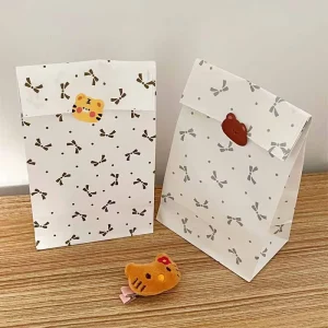 Eco-Friendly Customizable Kraft Paper Bag Little Bow Design Supermarket Promotion Fashionable Candy Packaging Handle