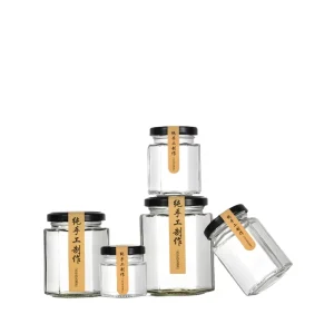 Factory Custom Clear Hexagonal Shape Glass Peanut Butter Jar with Metal Cap for Food Packaging Glass Bottle