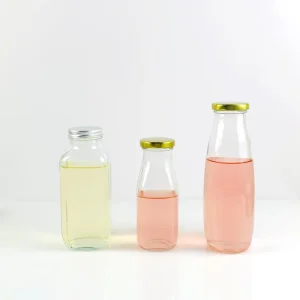 Free Sample Empty Glass Bottle for Milk Juice Coffee Tea Beverage Energy Drinks Carbonated Drinks with Plastic Lids