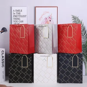 Gold Stamping And Embossed Gift Paper Bags With Drawstring Handles Elegant Eco Friendly Promotion Packaging Gift Bags