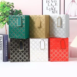 Gold Stamping And Embossed Ivory Card Paper Bags With Drawstring Handles Hangtag Eco Friendly Promotion Shopping Gift Bags