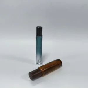 Gradient Amber Embossed Glass Roll on Bottles Stainless Steel Roller Ball for Perfume Essential Oil with Black Cap Custom Logo