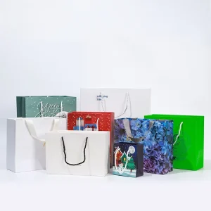 High End Kraft Paper Shopping Gift Bags Handles for Clothing Wine Tea Packaging Personalized Logo Promotions