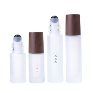 Low Moq Cosmetic Essential Oil Perfume 5ml 10ml Custom logo Frosted Glass Roller Bottle with Dark Wooden Cap