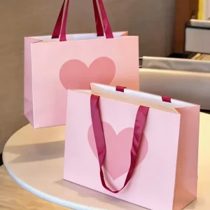 Luxury Custom Logo Paper Gift Bags Apparel Packaging Printed Shopping Bags With Handles Fashion Brands Your Own Logo