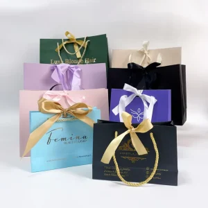 Luxury Custom Recyclable Paper Bag Cosmetics Gift Bags Gold Foil Printed Jewelry Packaging Shopping Bags Ribbon Handle Promotion