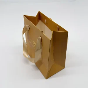 Luxury Eco Friendly Gold Foil Paper Shopping Bag with Custom Logo Ribbon Handle for Jewelry Boutique Promotion Supermarket Use