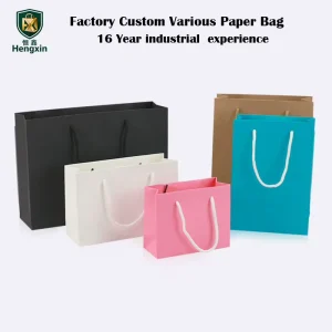 Luxury Gift Shopping Coated Paper Carry Bags with Cotton Rope Handles Ribbon Disposable Flexo Printed Custom Logo