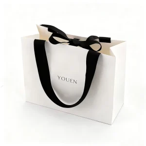 Luxury Tote Paperboard Gift Bags with Ribbon Handle Customized Euro Logo for Clothing Socks Shoes Fur Recycled Materials