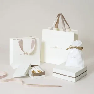 Luxury White Paper Bags with Satin Ribbon Handles Custom Logo Printed Matte Gift Bags for Jewelry Packaging Small Boutique