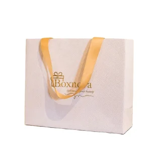 Luxury White Recyclable Rectangle Paper Shopping Bag Gold Ribbon Handles Custom Logo Embossed Gift Bag Beauty
