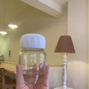 Manufacturer Food Grade Glass Jar 200ml Clear Food Jars with Plastic Cap