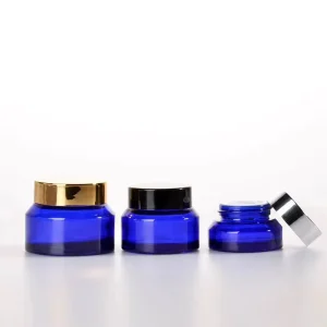 ODM Supplier Factory Custom Cobalt Blue Glass Jar Sloping Shoulder Glass Jar 15ml Cosmetic Eye Cream Bottle Packaging 0.5oz with Screw Cap Manufacturer