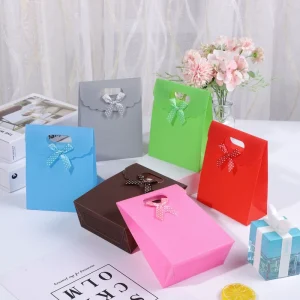OEM logo Gift Paper Bags Designed Embossing Matte Flat Back Cardboard Thank You Holiday Bag with Handle