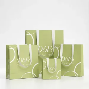 Paper Gift Bag Minimalist Green Paper Bag Set with White Curved Graphics and Brand Logo for Cake Cafe Dessert Takeaway Packaging