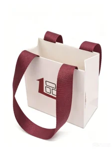 Premium Luxury Cosmetic Shopping Paper Bag With Satin Ribbon Handle Custom Logo Eco Gift Packaging Bag for Beauty Skincare Store