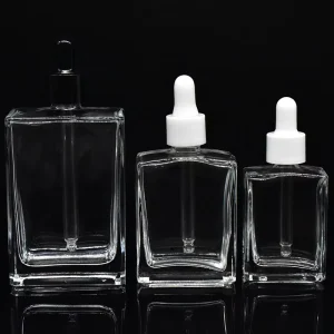 Rectangular Glass Clear Dropper Bottle 30ml 50ml 100ml Transparent Glass Skin Care Essence Bottle With Plastic Cap